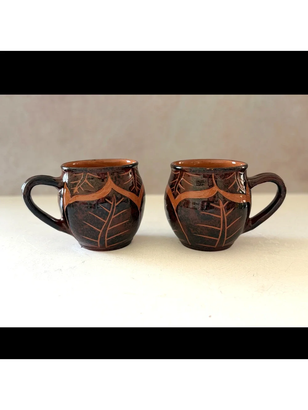 Wassi Art Jamaican Pottery Mug Pair | Hand Carved Leaf Redware Coffee Cups